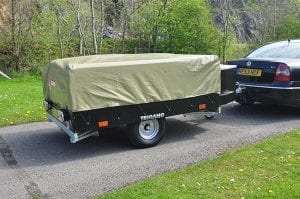 Car towing trailer